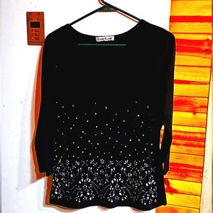 Black long-sleeved top, size large, with sparkly snowflake embellishments. Shein
